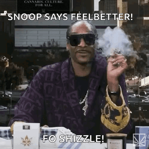 Snoop Dogg Is Smoking A Cigarette While Wearing Sunglasses And A Purple Jacket . GIF