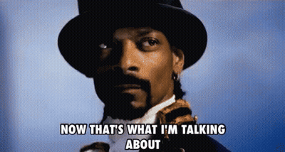 Snoop Dogg Is Wearing A Top Hat And Tie And Says Now That 'S What I 'M Talking About GIF