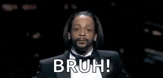 Snoop Dogg Is Wearing A Tuxedo And Smoking A Cigarette And Says Bruh ! GIF