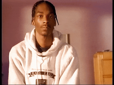 Snoop Dogg Is Wearing A White Hoodie That Says ' Trademark ' On The Front GIF