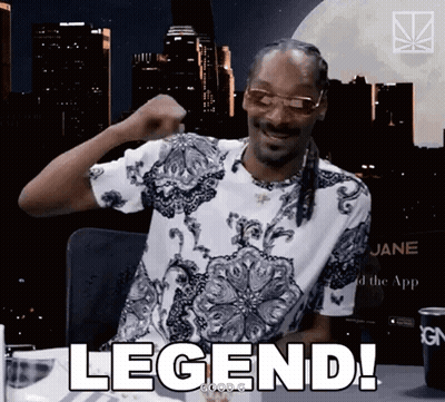Snoop Dogg Is Wearing Sunglasses And A Shirt That Says Legend On It GIF