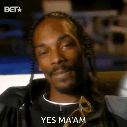 Snoop Dogg Is Wearing Sunglasses And Braids And Says Yes Ma Am GIF