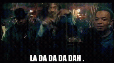 Snoop Dogg Standing In Front Of Group Saying La Da Da Da Dah GIF