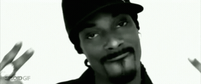 Snoop Dogg Wearing Hat Giving Peace Sign GIF