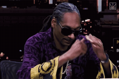 Snoop Dogg Wearing Sunglasses And Purple M Shirt GIF
