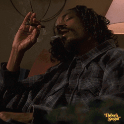 Snoop Dogg Who Is Smoking While Eyes Close GIF