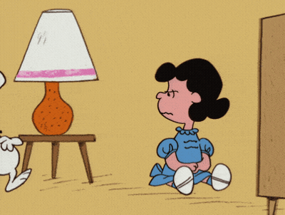 Snoopy And Lucy With Lamp Behind Them GIF