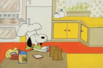 Snoopy In Chef Hat Holding Bread GIF