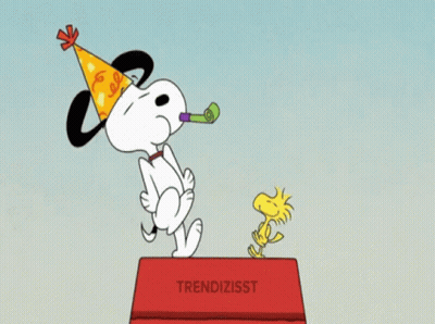 Snoopy In Party Hat Standing On Trendizisst Box GIF