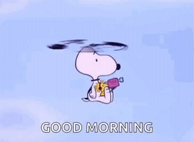 Snoopy Is Flying Through The Air While Holding A Candy And A Flower . GIF
