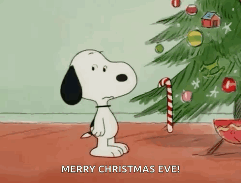 Snoopy Is Holding A Candy Cane In Front Of A Christmas Tree And Wishing Merry Christmas Eve . GIF