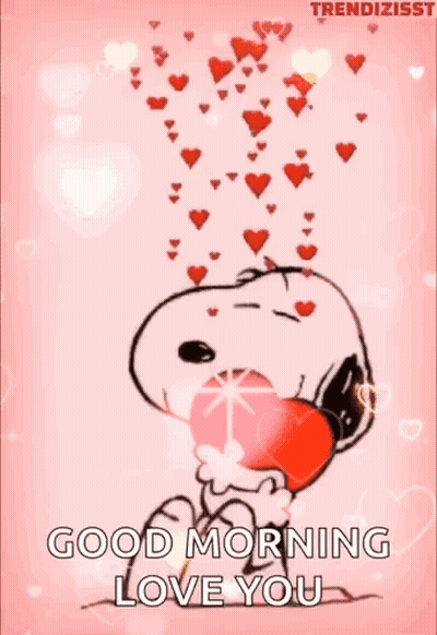 Snoopy Is Holding A Heart In His Mouth With Hearts Coming Out Of His Mouth . GIF
