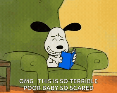 Snoopy Is Sitting In A Chair Reading A Book And Says Omg This Is So Terrible Poor Baby So Scared . GIF