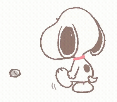 Snoopy Is Standing Next To A Rock And Looking At It . GIF