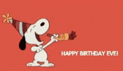 Snoopy Is Wearing A Party Hat And Blowing A Party Horn While Celebrating His Birthday . GIF