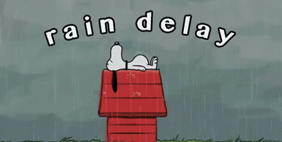 Snoopy Laying On Red Doghouse In Rain GIF