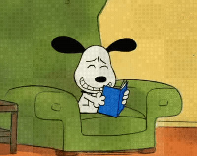 Snoopy Reading Book In Green Chair GIF