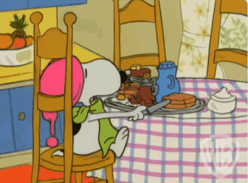 Snoopy Sitting At Table With Food GIF