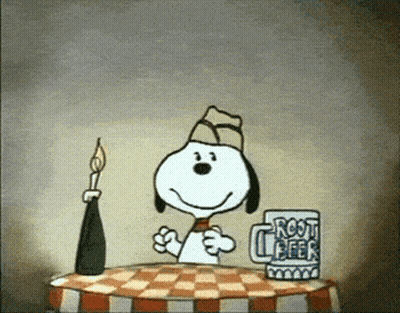 Snoopy Sitting At Table With Root Beer Mug GIF
