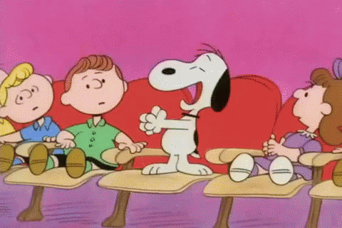 Snoopy Standing Before Children Seated In Theater GIF