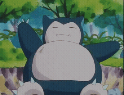 Snorlax From Pokemon Is Laying Down In The Woods With His Eyes Closed . GIF