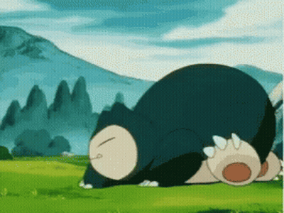 Snorlax From Pokemon Is Sleeping In The Grass In A Field . GIF