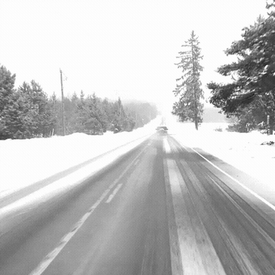 Snow Covered Road In Black And White GIF
