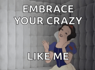 Snow White Is Sitting In A Cell With The Words `` Embrace Your Crazy Like Me '' Written On It . GIF