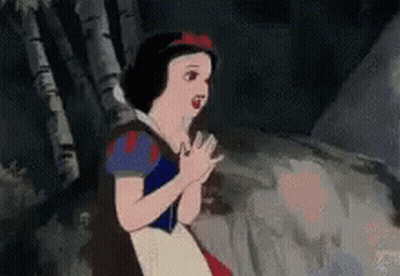 Snow White Standing In Woods With Hands Together GIF