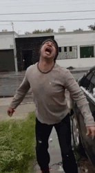 Snowball Fight Hit The Man's Face GIF