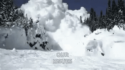 Snowboarder Riding Down Snow Slope GIF