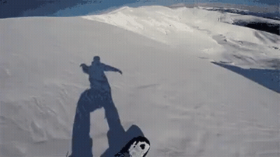 Snowboarder Shadow On Snowy Mountain GIF