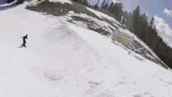 Snowboarding Spin Cliff Slide GIF