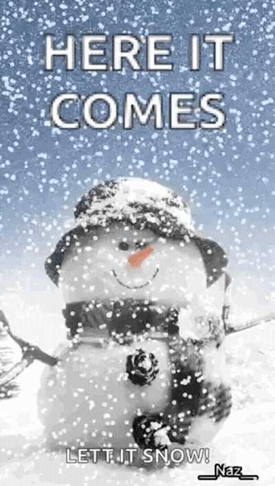 Snowman In Hat And Scarf Saying Here It Comes Let It Snow GIF
