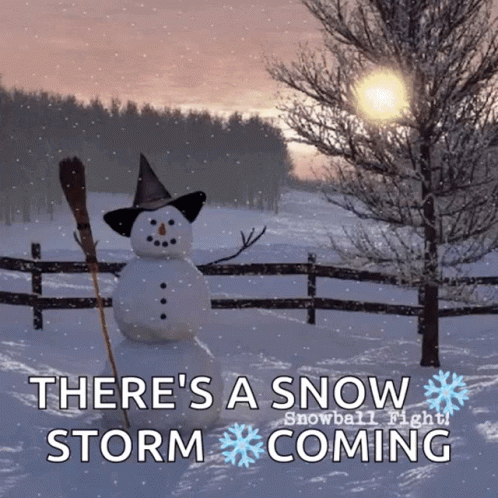 Snowman In Witch Hat Holding Broom Says Snow Storm Coming GIF