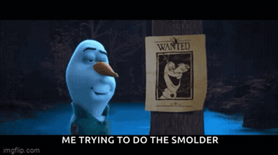 Snowman Next To Wanted Poster Saying Me Trying To Do The Smolder GIF
