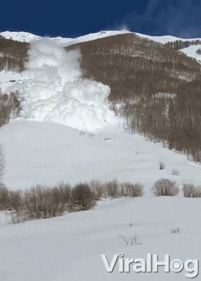 Snowy Mountain With Viralhog Text GIF