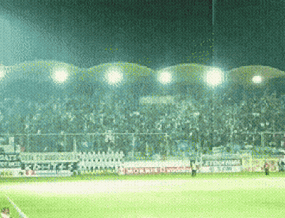 Soccer Field At Night With Sparta Banner GIF