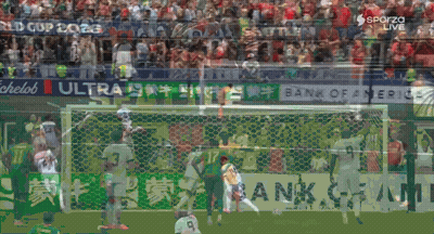 Soccer Game In Front Of Bank Of America Ad GIF