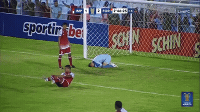 Soccer Game In Front Of Betting Banner GIF
