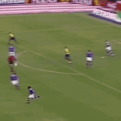 Soccer Game In Front Of Coca Cola Ad GIF