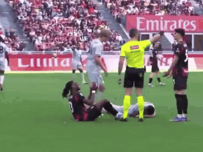 Soccer Game In Front Of Emirates Sign GIF