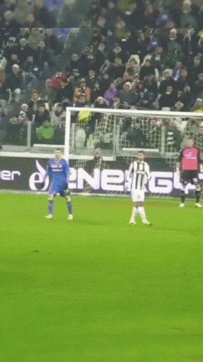 Soccer Game In Front Of Energy Ad GIF