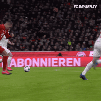 Soccer Game In Front Of FC Bayern.tv Sign GIF
