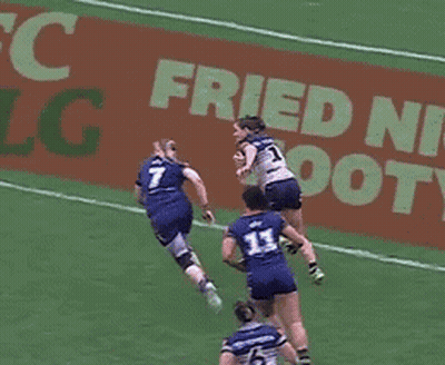 Soccer Game In Front Of Fried N Foot Sign GIF