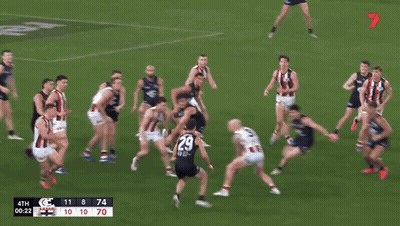 Soccer Game In Front Of Giant Thompson Banner GIF