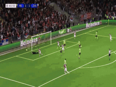 Soccer Game In Front Of Heineken Sign GIF