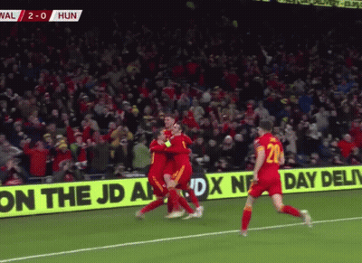 Soccer Game In Front Of JD Ad GIF
