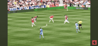 Soccer Game In Front Of Rainhams Fell Banner GIF