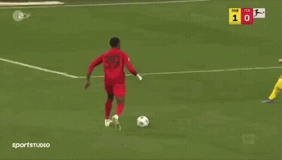Soccer Game In Front Of Rheinmetall Banner GIF